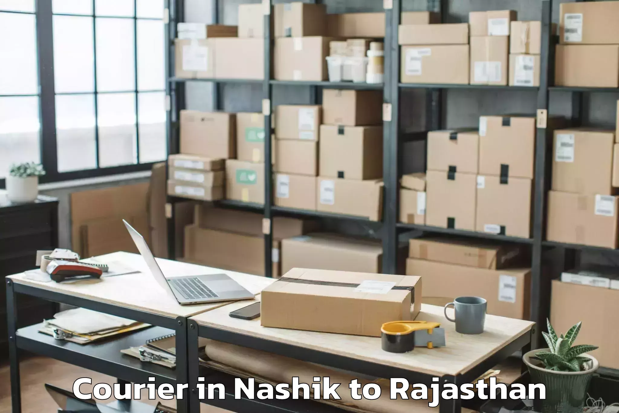 Leading Nashik to Bari Sadri Courier Provider